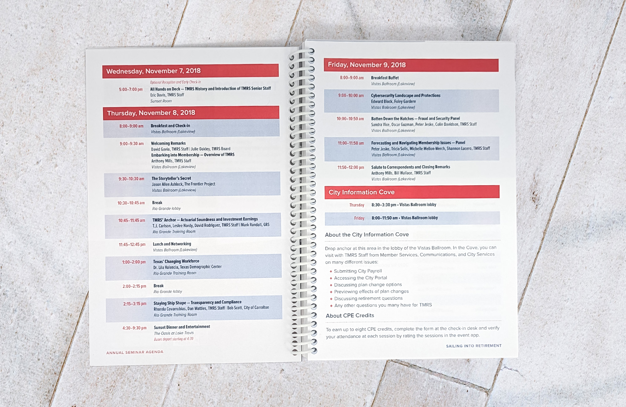 A coil-bound planner opened up to the itinerary for the 2018 TMRS Annual Seminar.