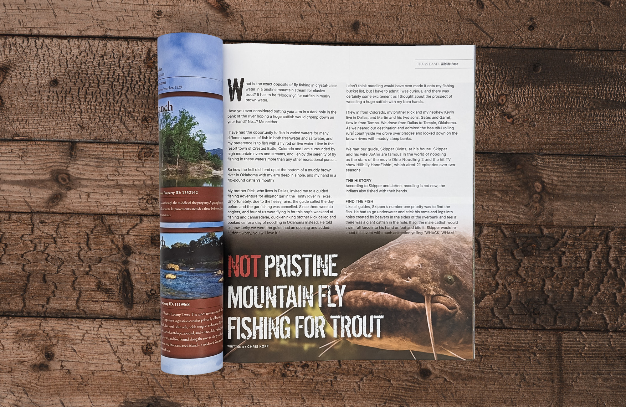 A magazine on a wooden surface. The left side of the magazine is rolled and tucked underneath. The right page is for an editorial titled Not Pristine Mountain Fly Fishing For Trout. Beside the title is an ominous picture of a catfish.