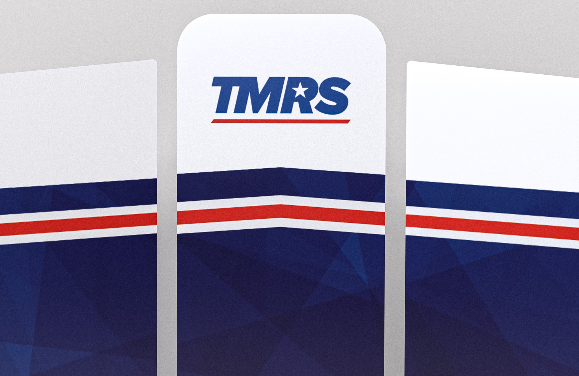 A close up view of a booth that displays in three parts. The middle panel displays the TMRS logo at the top. class=