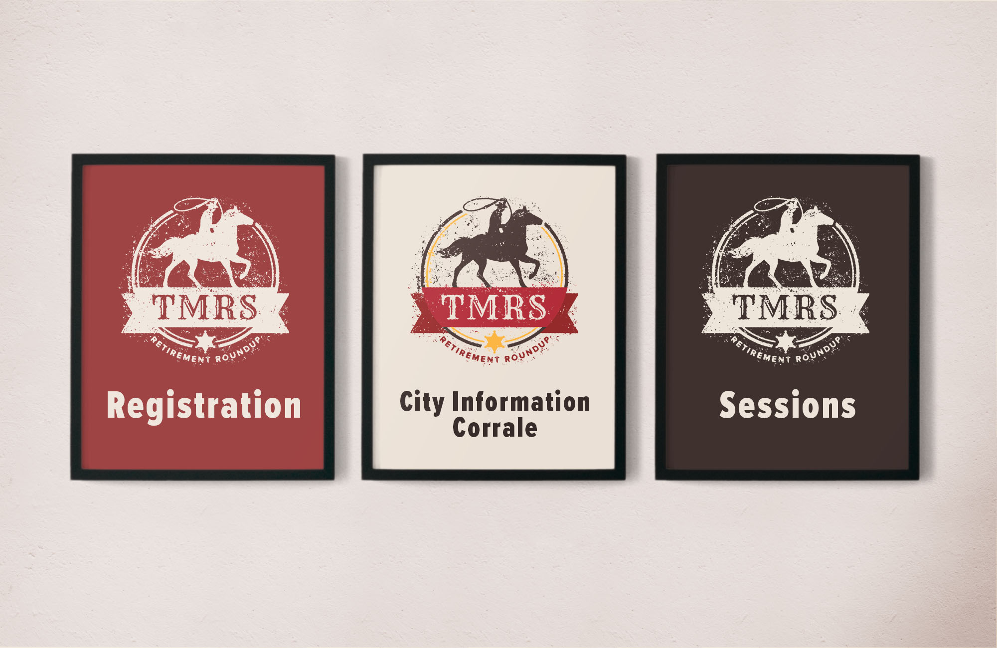 Three similar signs are hung up on a white wall. All three feature the Retirement Roundup emblem, but with different color schemes. The middle sign has a cream background with the full color logo and City Information Corrale written underneath. The left sign has a read background with a cream logo and says Registration, The right sign has a brown background with a cream logo and says Sessions